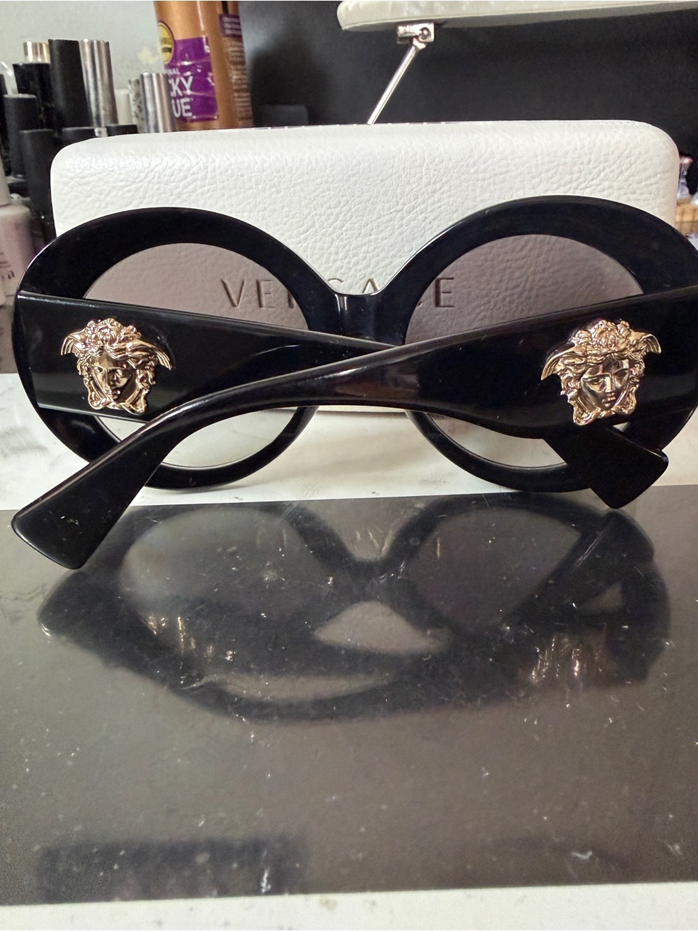 Versace Black Round Sunglasses with Gold Medusa Details